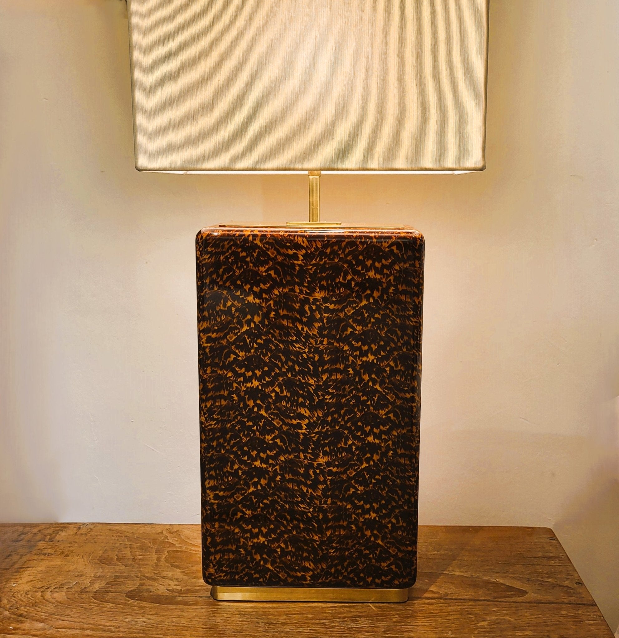 Faux tortoise shell table lamp from Inside Living, decorative home lighting with a warm patterned amber-toned finish