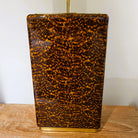 Faux tortoise shell table lamp from Inside Living, decorative home lighting with a warm patterned amber-toned finish