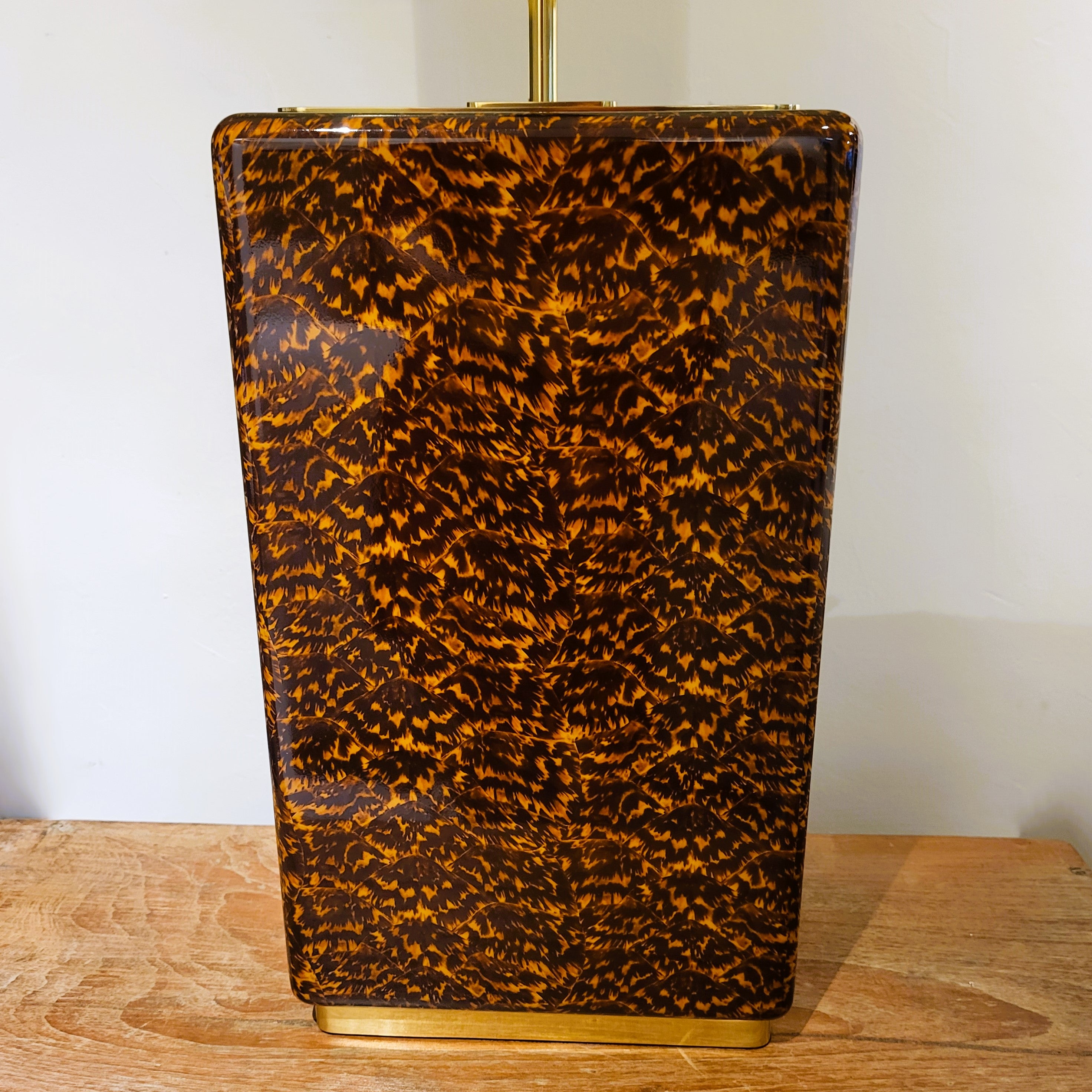 Faux tortoise shell table lamp from Inside Living, decorative home lighting with a warm patterned amber-toned finish
