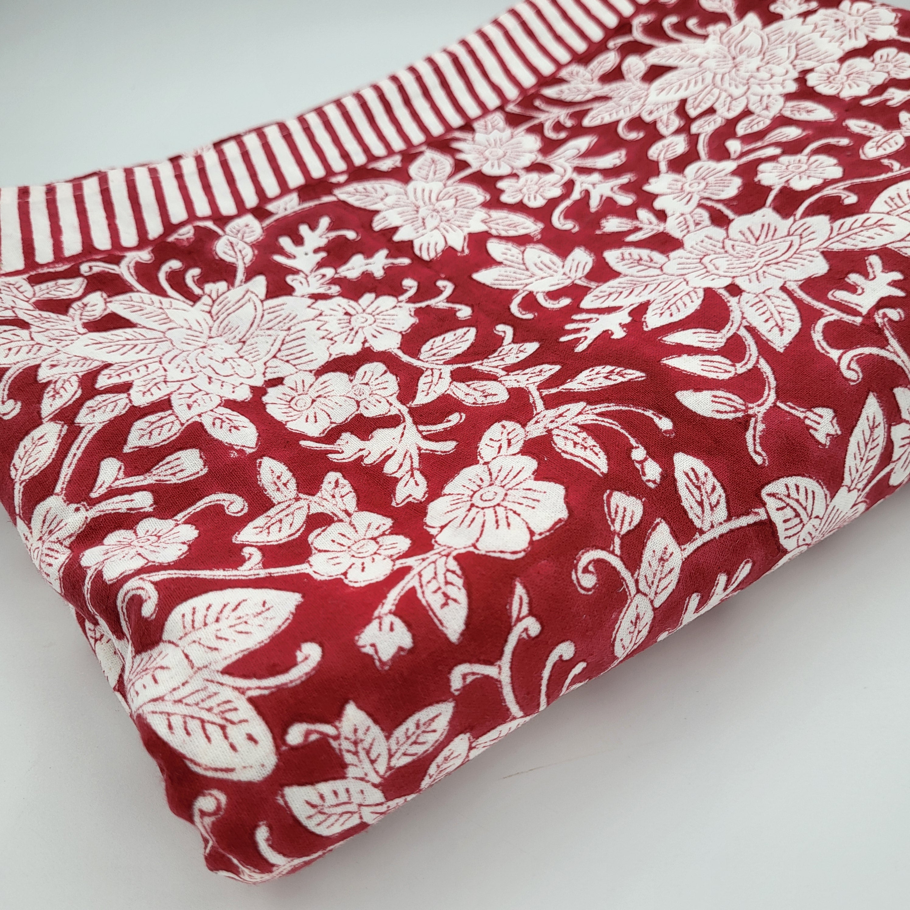 Deep red block print cotton tablecloth with white floral pattern and striped border, various sizes