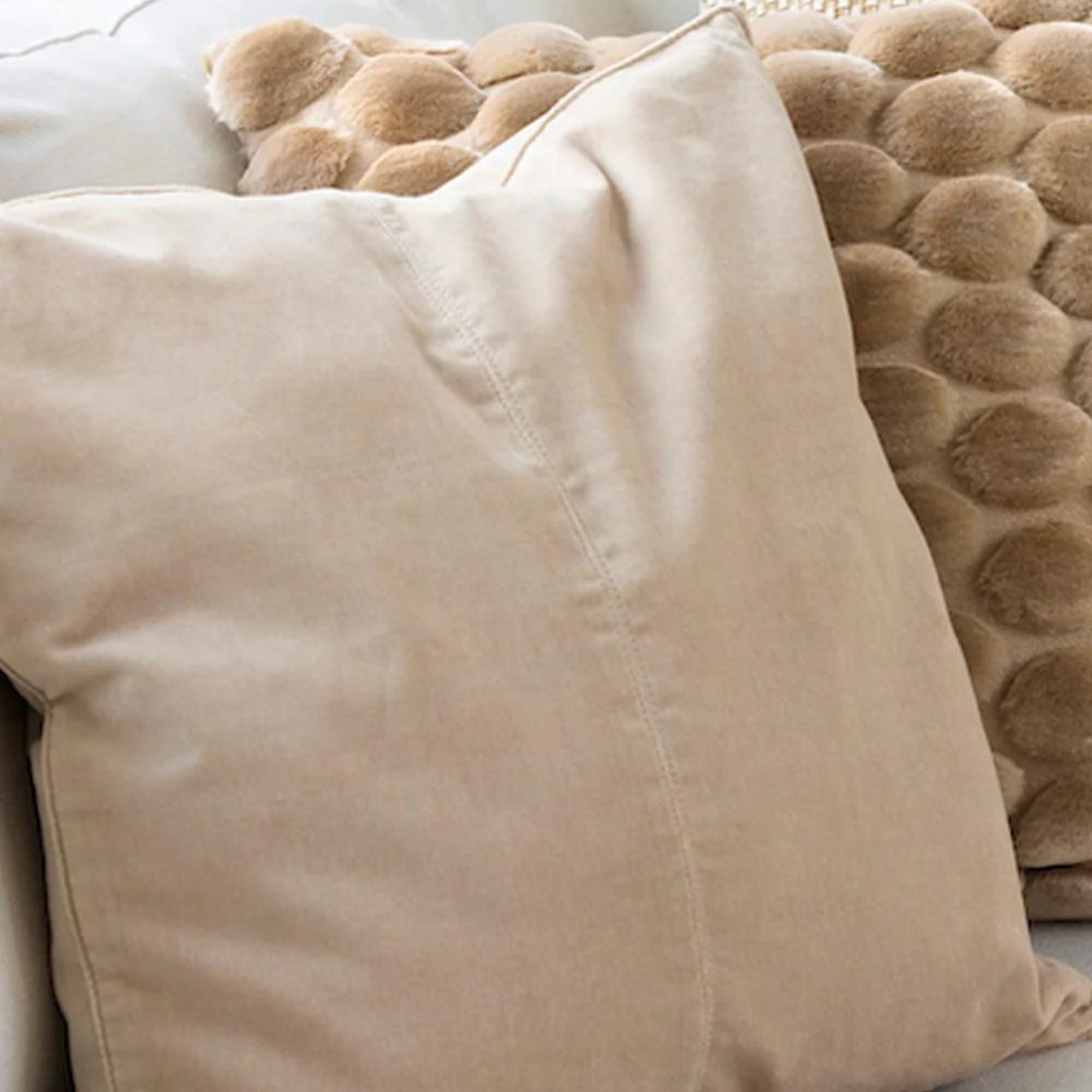 Velvet Base New Beige Cushion from Inside Living Singapore, cushions. Shown styled in a home setting.