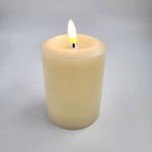 Ivory flameless LED pillar candle from Inside Living, realistic flickering battery candle for safe ambient lighting