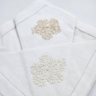 Hand-embroidered floral linen napkin in natural from Inside Living, decorative table napkin for fine dining, alternate view