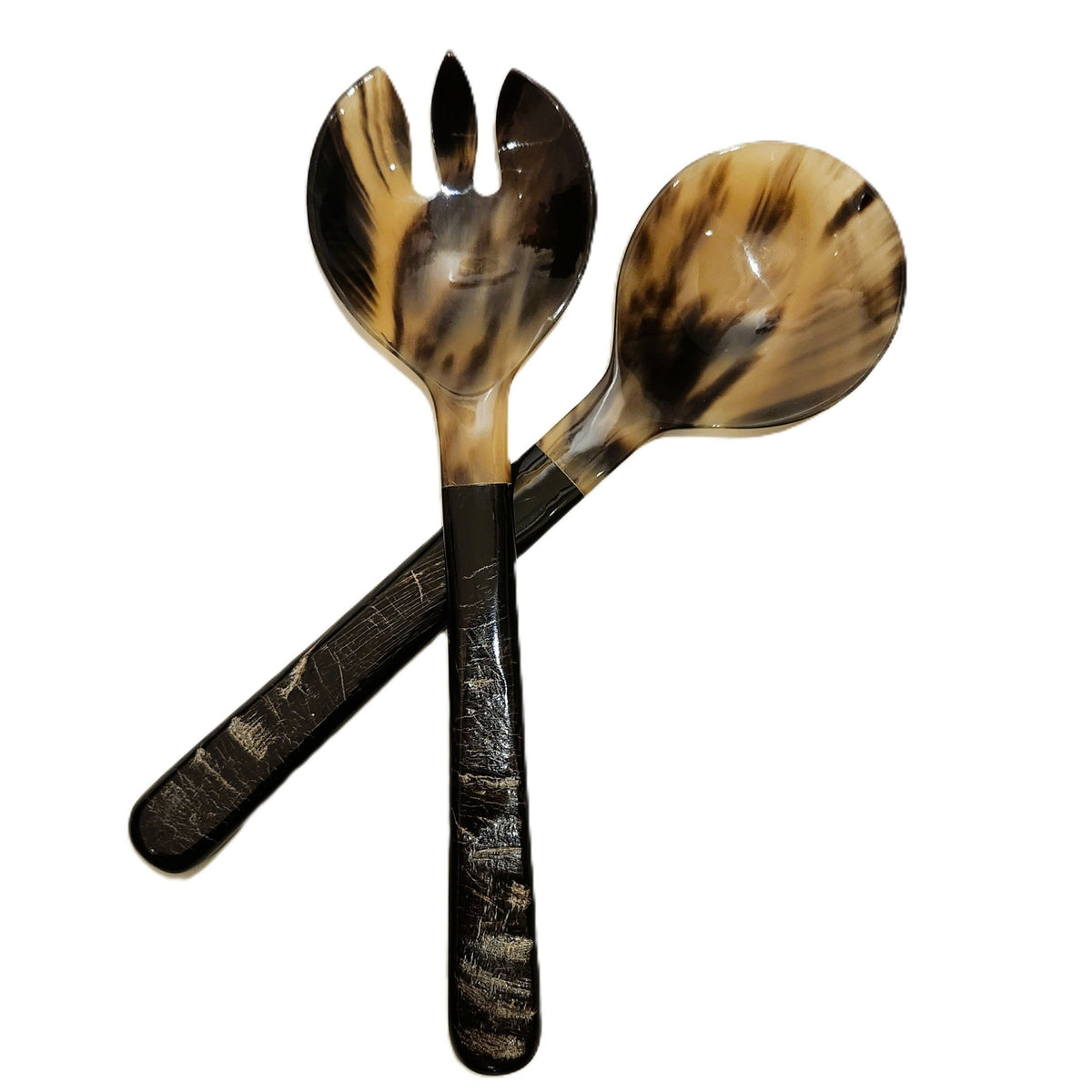 Pair of large horn salad servers with roughly carved horn handles that take on the grain and colour of wood, each pair unique