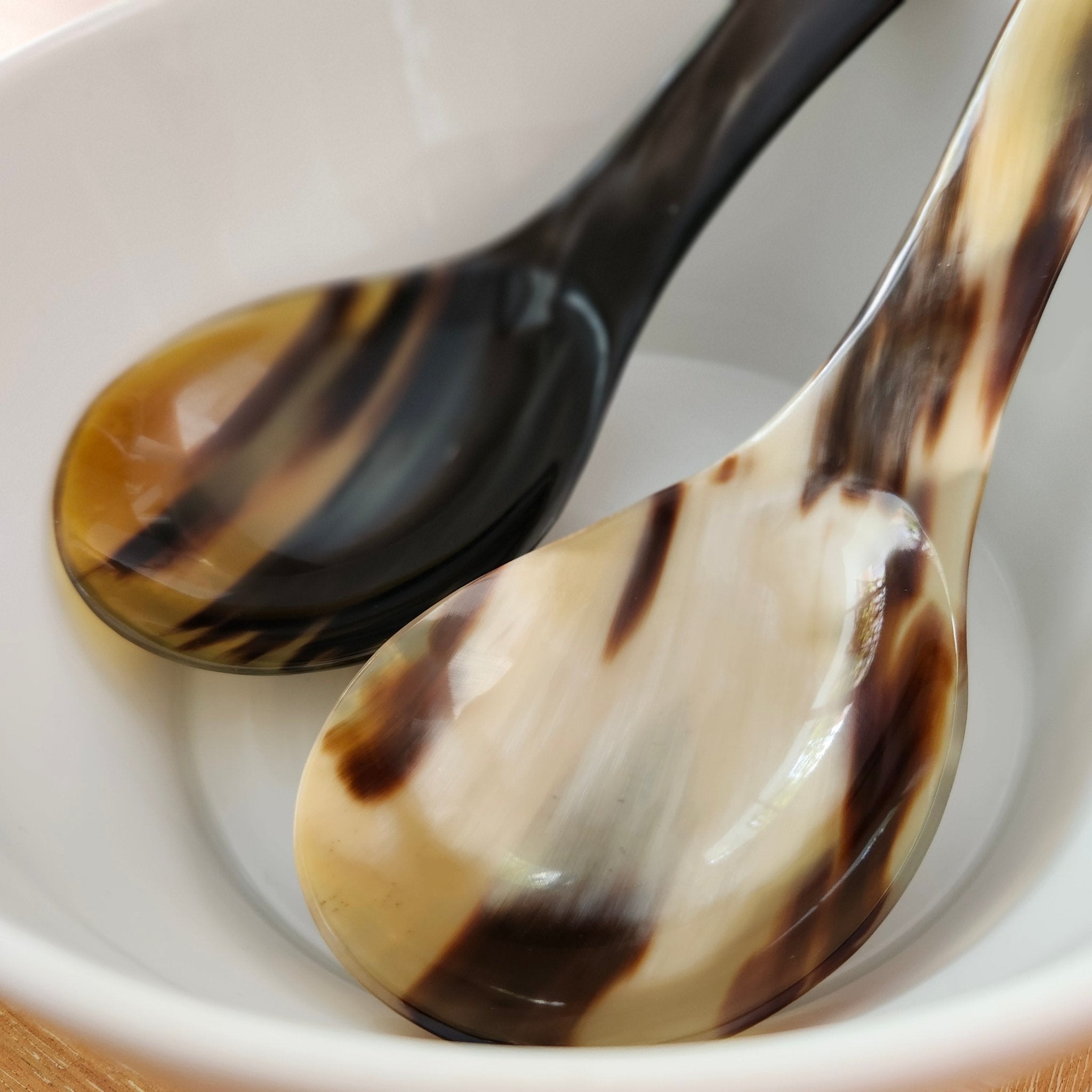 Rice spoon handcrafted from horn for serving, each one naturally unique, a distinctive table piece
