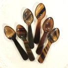 Tiny hand-carved horn salt or pepper spoon, 6 cm long with a tortoiseshell look, each one unique