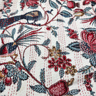 Kantha cotton throw and bedspread in peacock design, handmade quilted bedcover with running-stitch detail, detail view