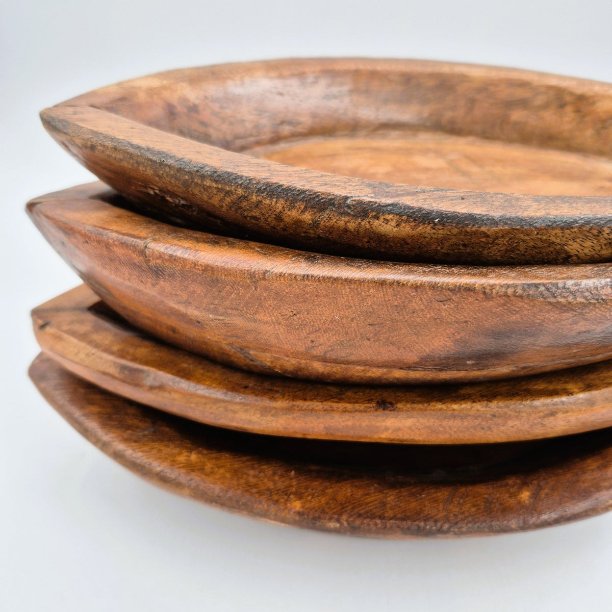 Almond-shaped vintage teak wood platter with a wipe clean surface, suited to serving fruit or salads on the table