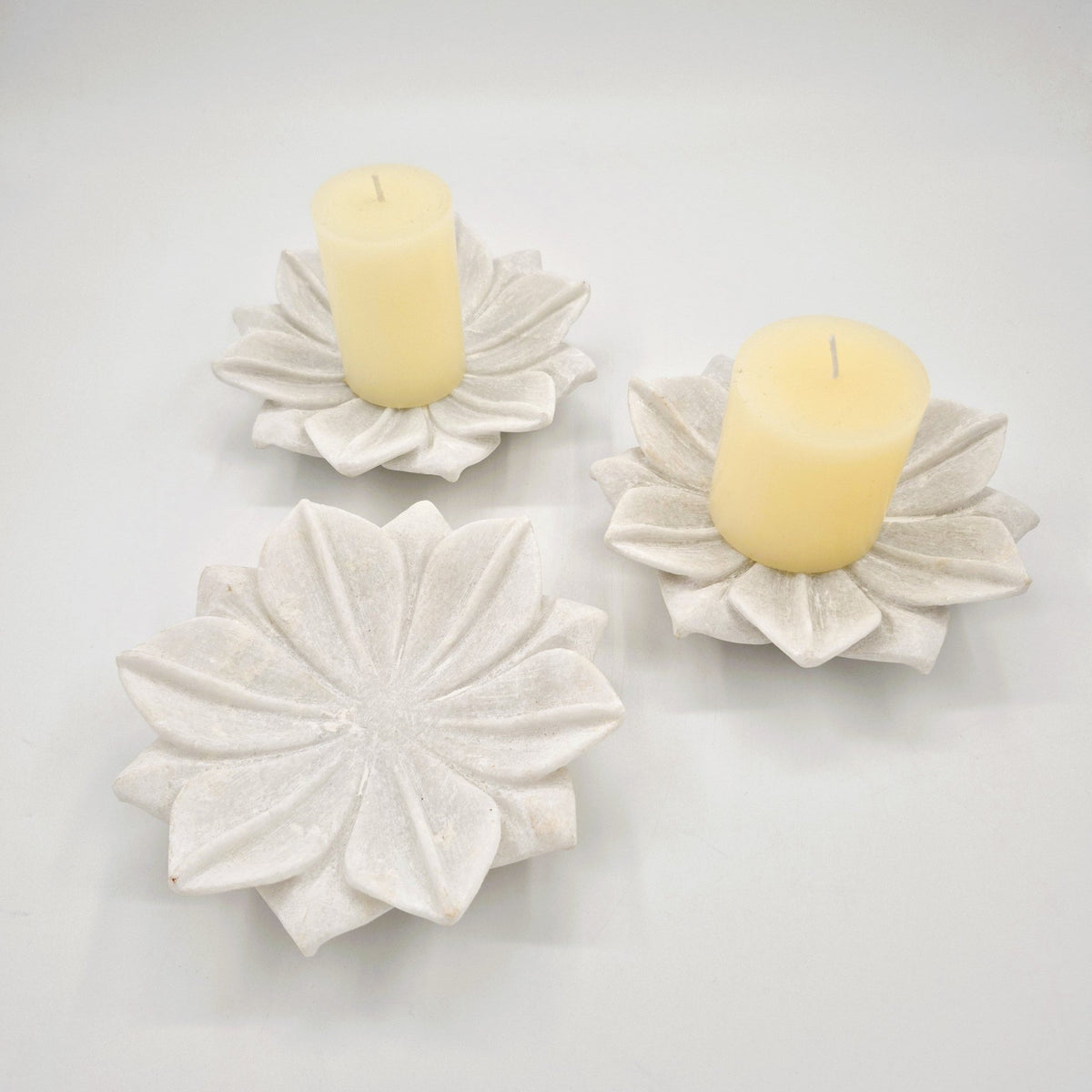 White marble dish carved by hand in a floral design, 23 cm across in the small size, for display, serving or candles