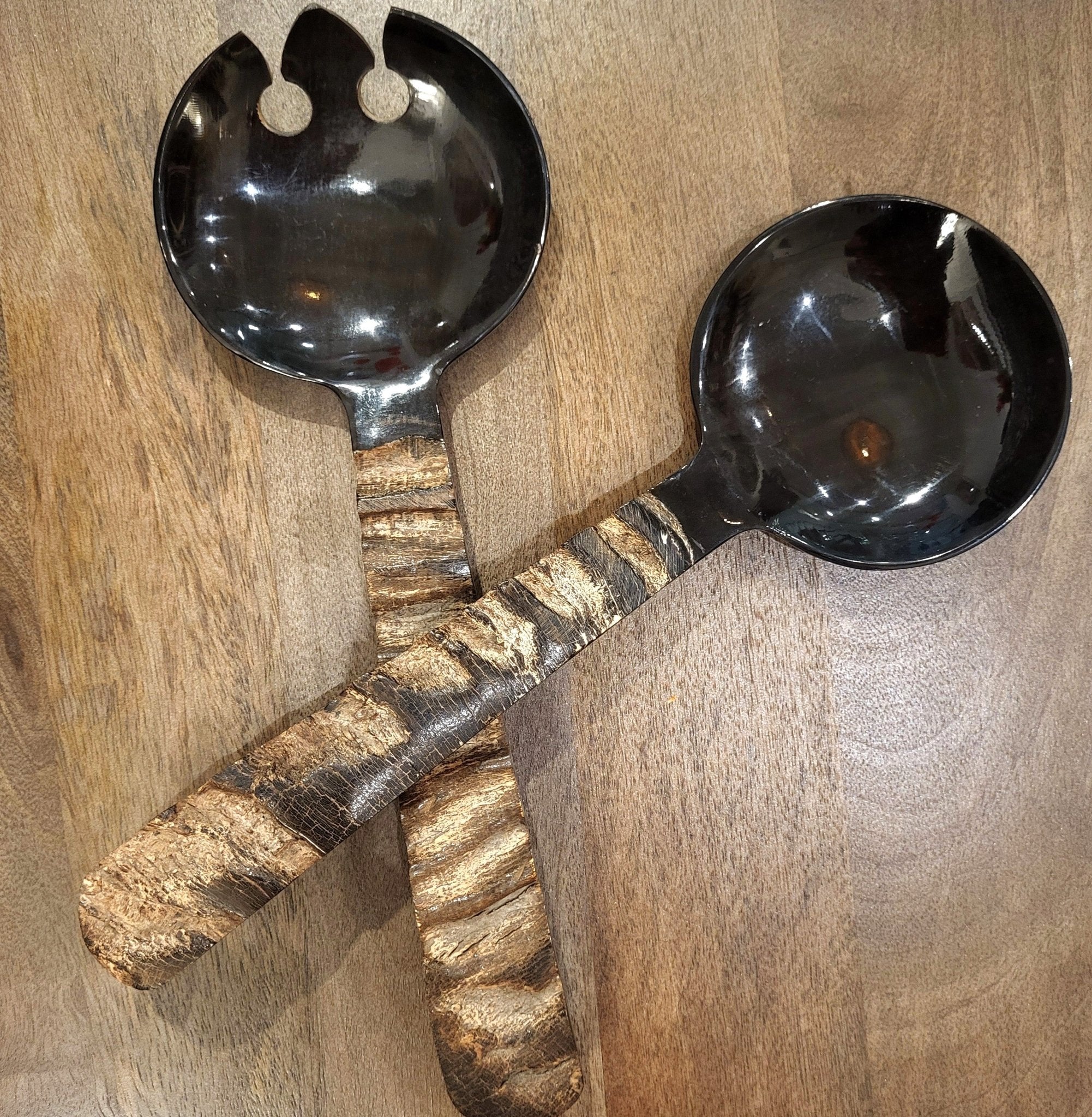 Set of 2 horn salad servers with handles carved to resemble wood, a natural handcrafted serving pair