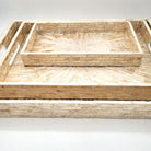 Ivory mother of pearl inlay serving tray with sunburst pattern on wood base, available in four sizes