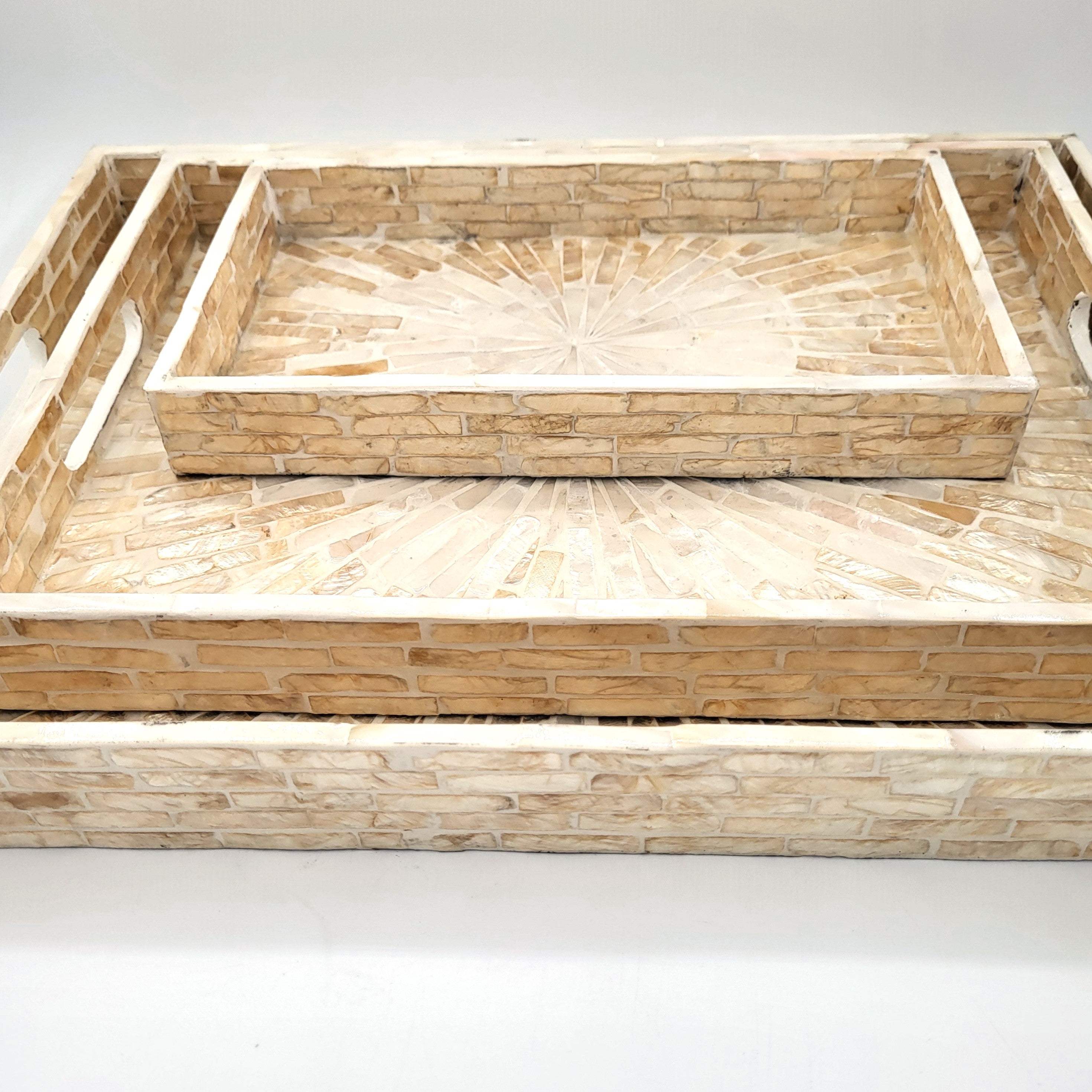 Ivory mother of pearl inlay serving tray with sunburst pattern on wood base, available in four sizes