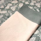 Set of six cotton napkins with a solid teal block-printed border, 48 x 48 cm, machine washable