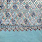 Embroidered Pashmina Small Circle from Inside Living Singapore. Shown styled in a home setting.