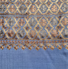 Embroidered Pashmina Small Circle from Inside Living Singapore. Shown close-up detail.