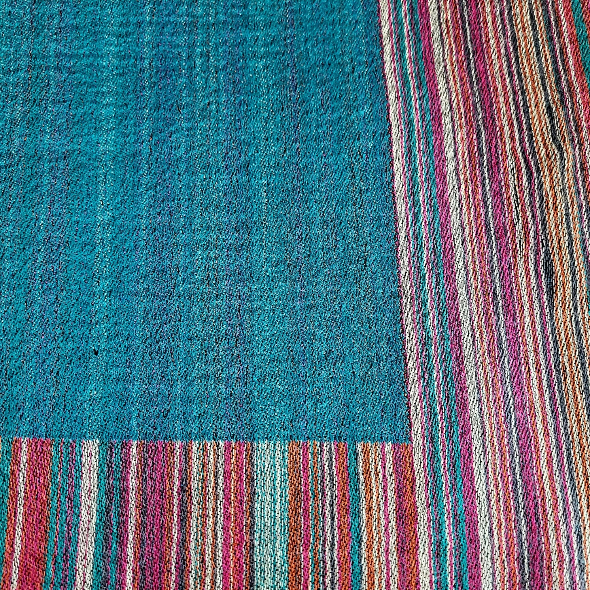 Multi Striped Pashmina Shawl, shown in context, from the Inside Living Singapore homeware collection.