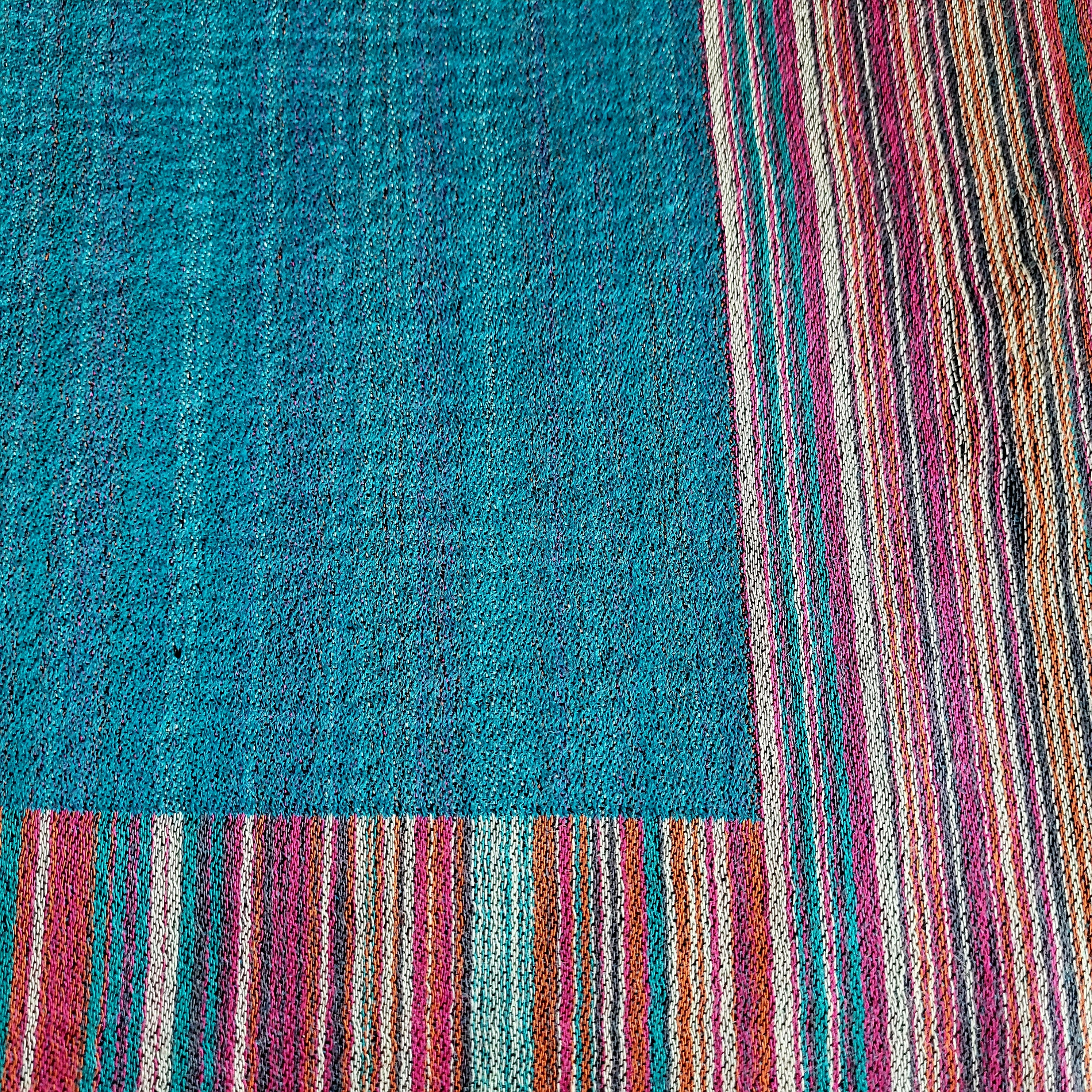Multi Striped Pashmina Shawl, shown in context, from the Inside Living Singapore homeware collection.