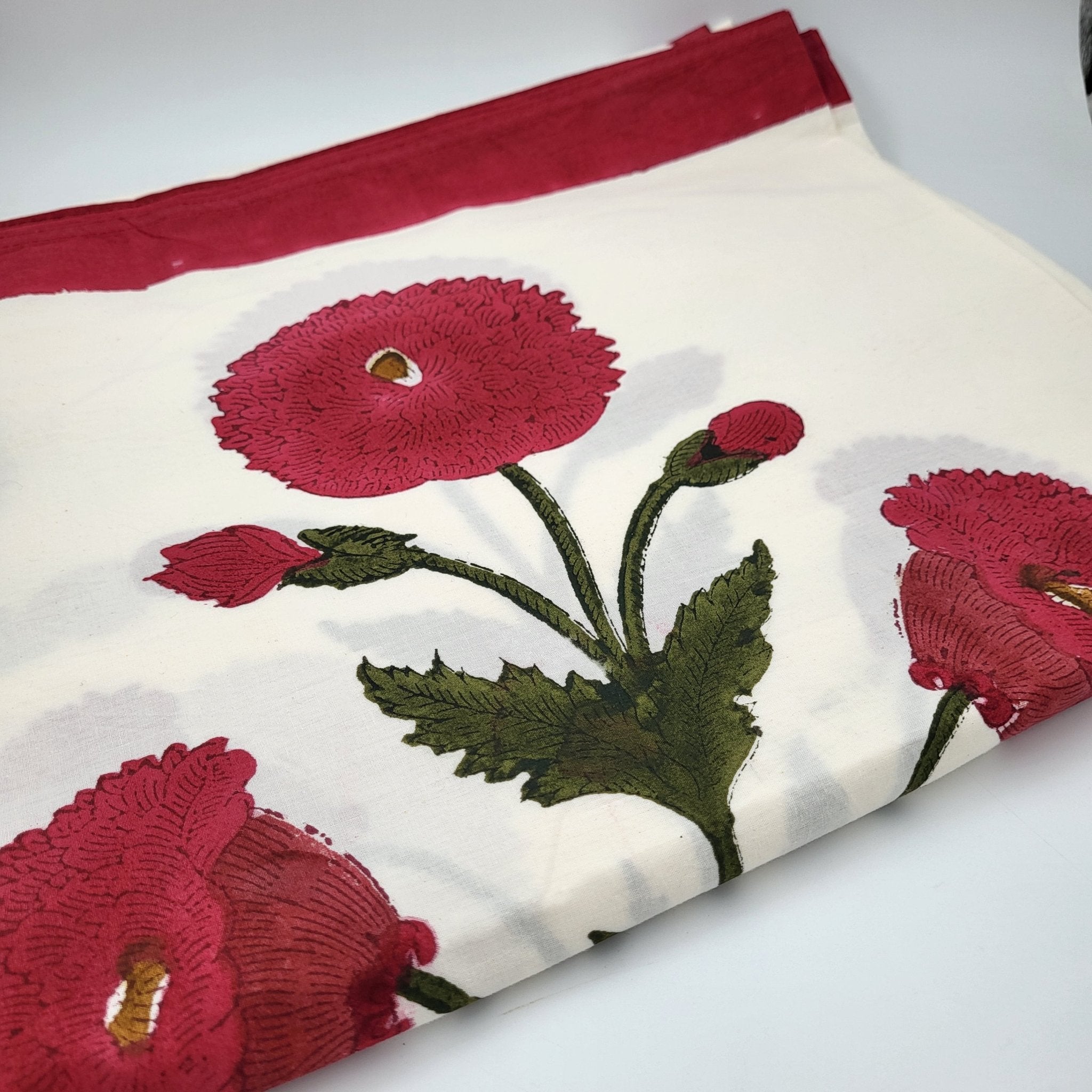 Block print cotton tablecloth in a cheerful poppy design with green and red, various sizes
