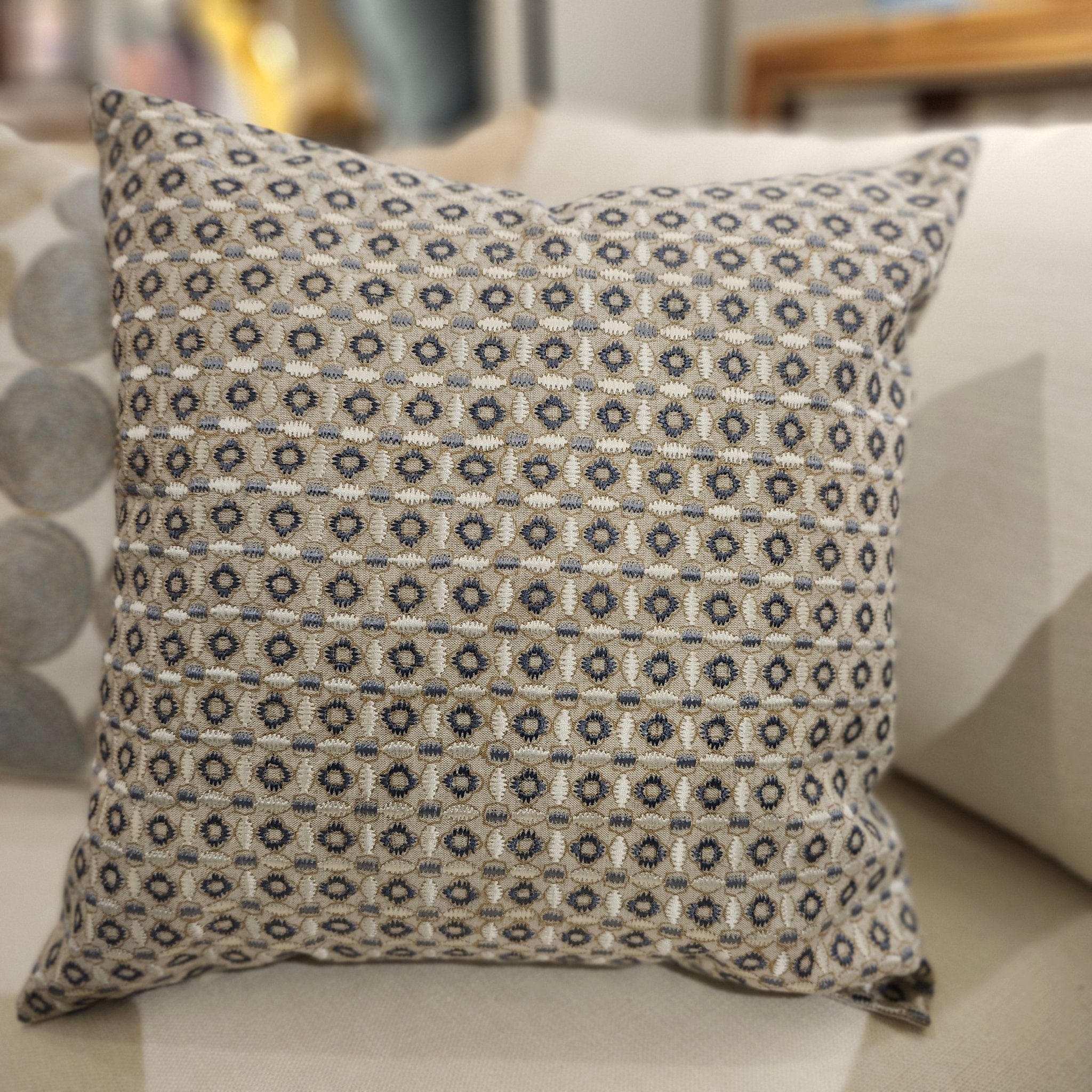 Embroidered Cushion 'Crescent', decorative cushion cover at Inside Living Singapore. Detail view.