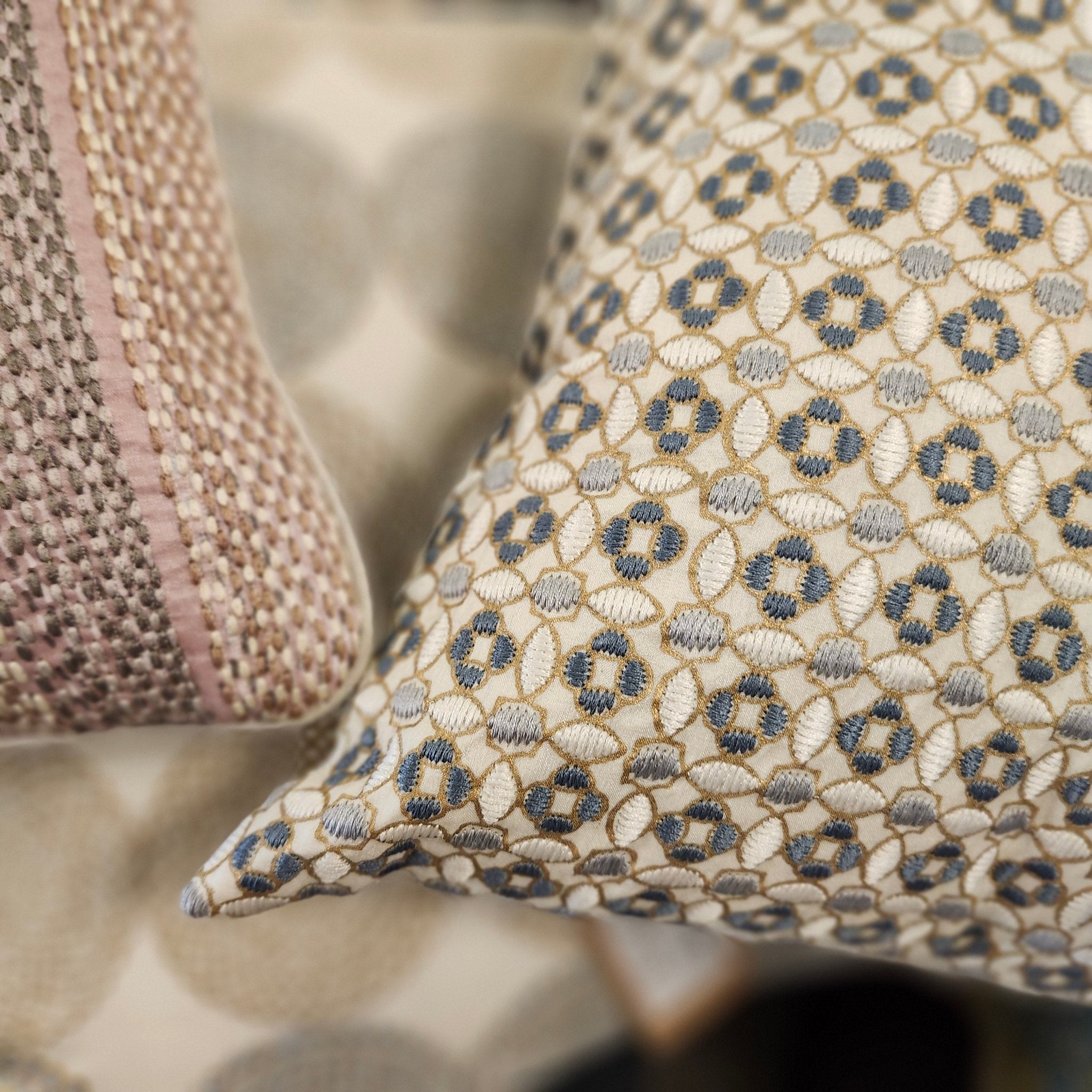 Embroidered Cushion 'Crescent', decorative cushion cover at Inside Living Singapore. Side view.