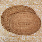 Oval handwoven natural rattan placemat, lightweight table mat for everyday and special dining.