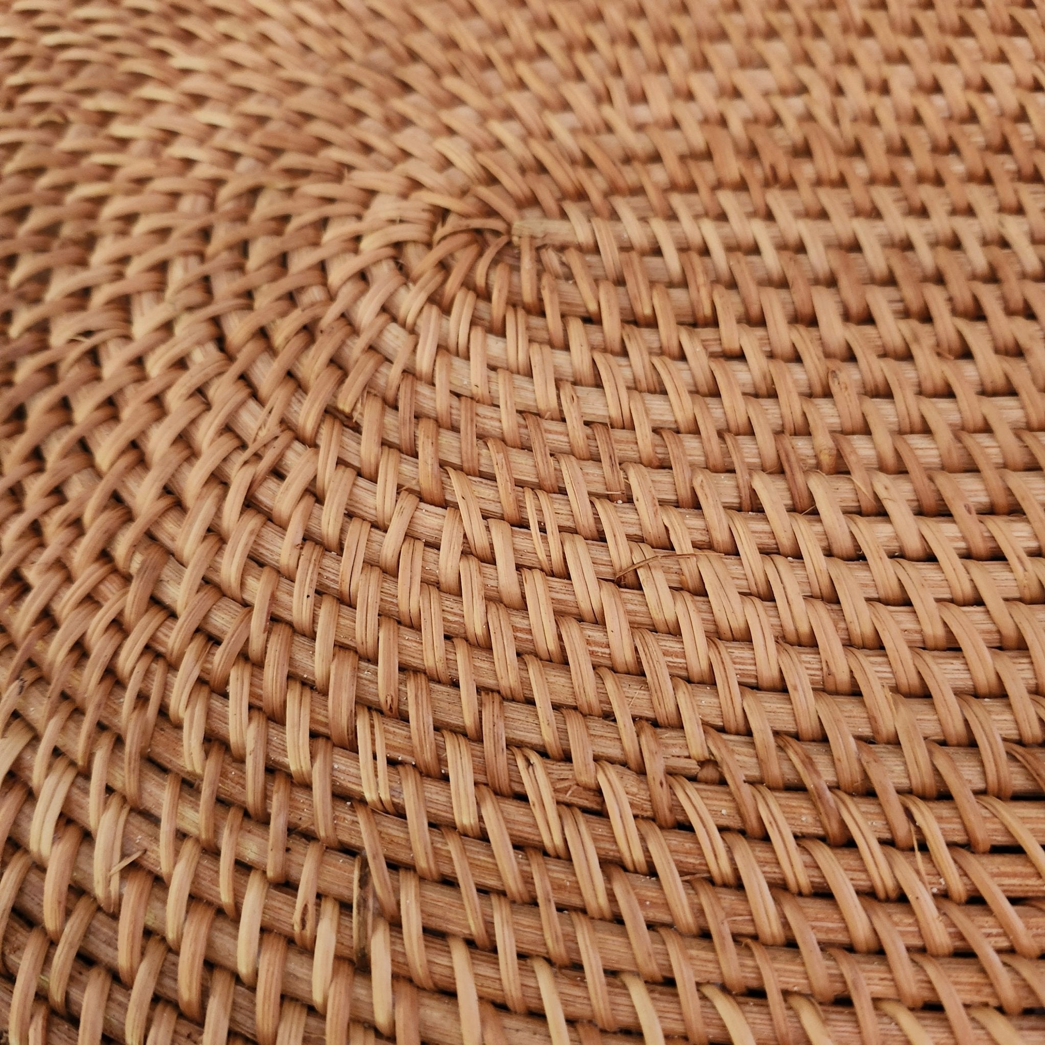 Oval handwoven natural rattan placemat, lightweight table mat for everyday and special dining, detail view