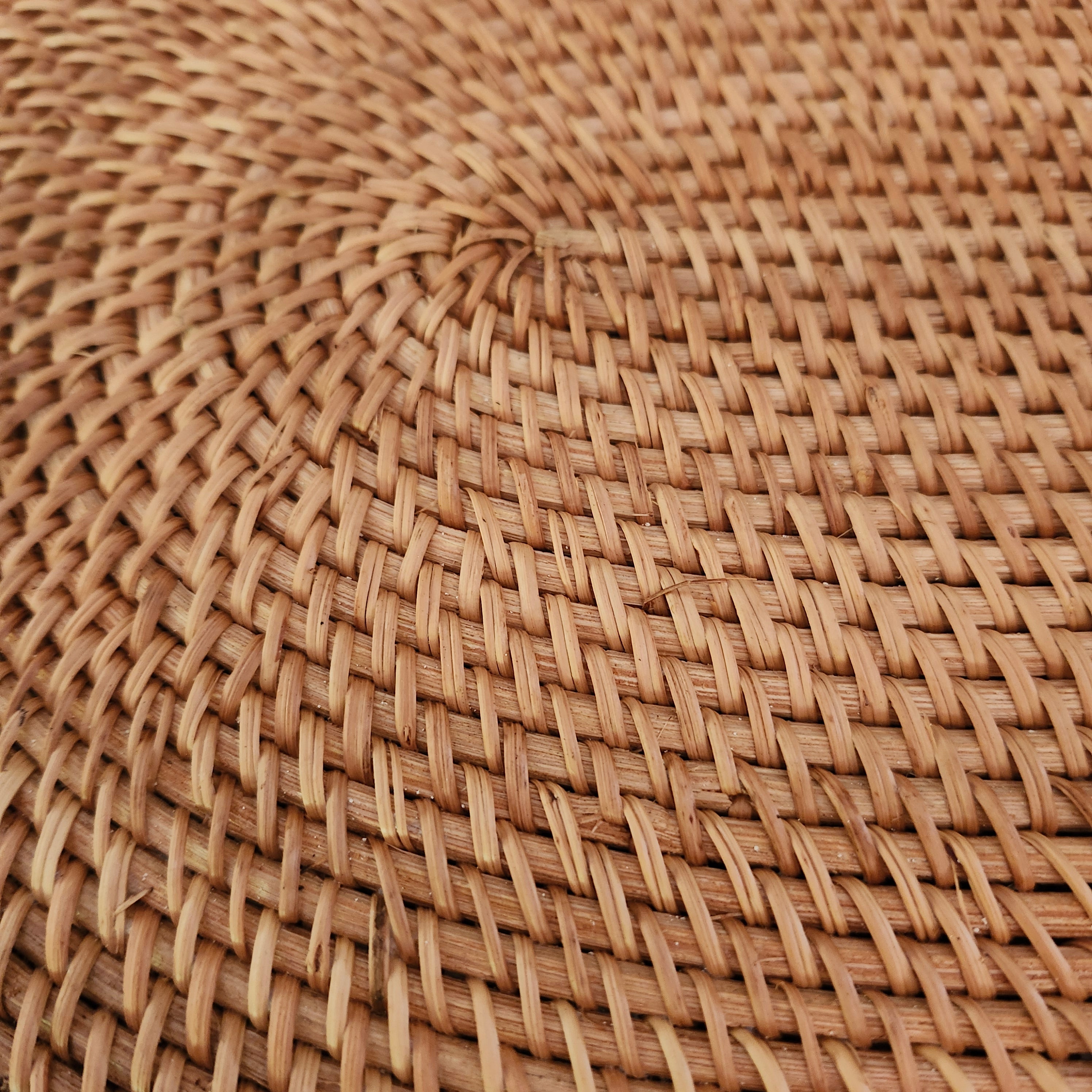 Oval handwoven natural rattan placemat, lightweight table mat for everyday and special dining, detail view