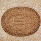 Oval handwoven natural rattan placemat, lightweight table mat for everyday and special dining, alternative view