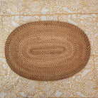Oval handwoven natural rattan placemat, lightweight table mat for everyday and special dining, close-up view