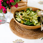 Round Rattan Placemat, close-up of the texture, from the Inside Living Singapore homeware collection.