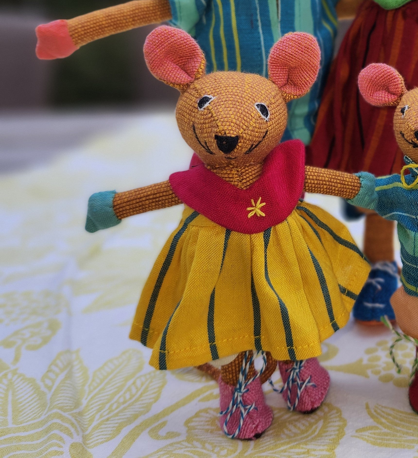 Handwoven Mouse from Inside Living Singapore, styled in a home setting.