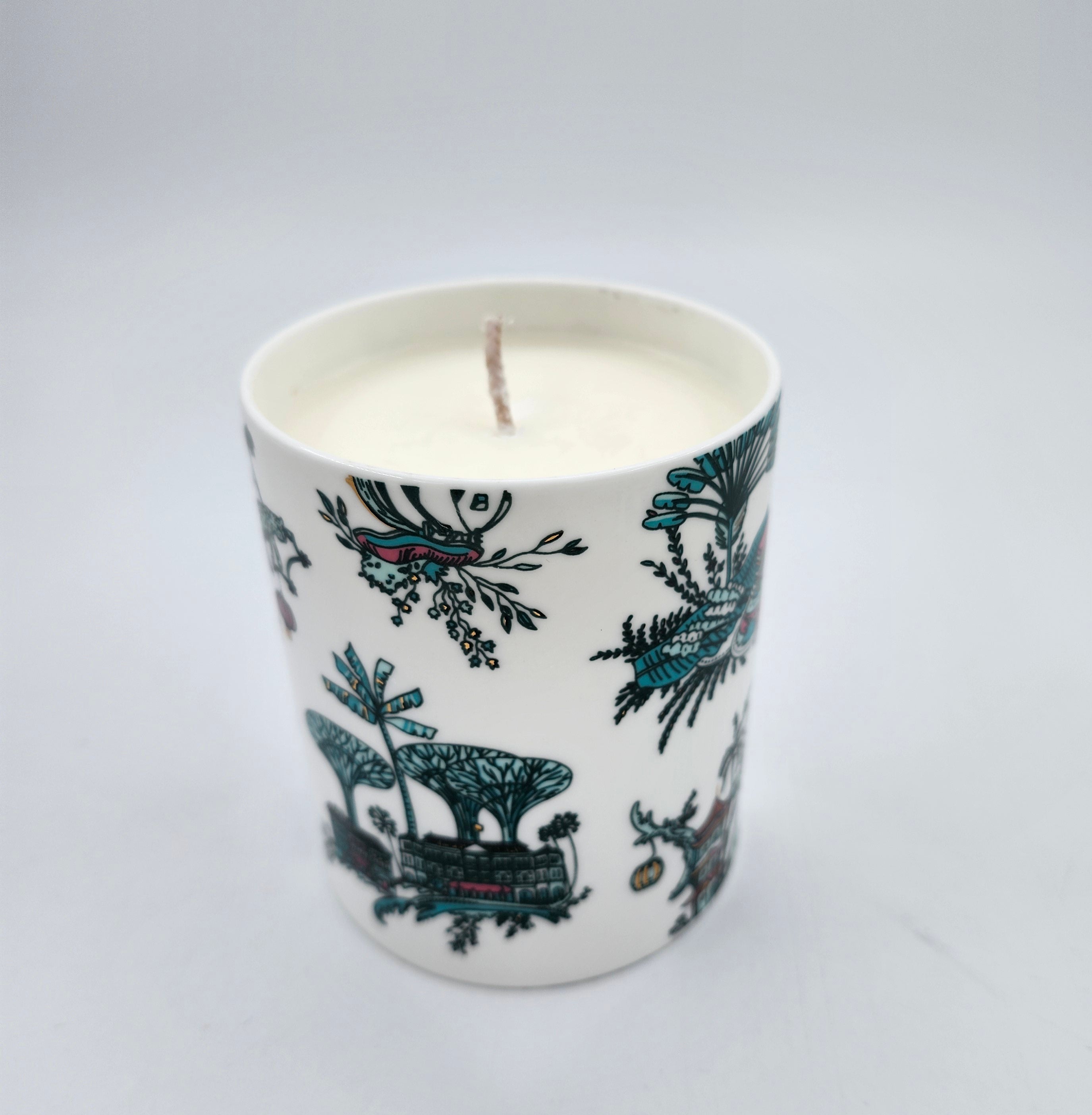 Singapore Toile Scented Candle from Inside Living Singapore, styled in a home setting.