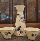 Fine bone china sake set with a Japanese toile design, one pourer and five cups in a gift box