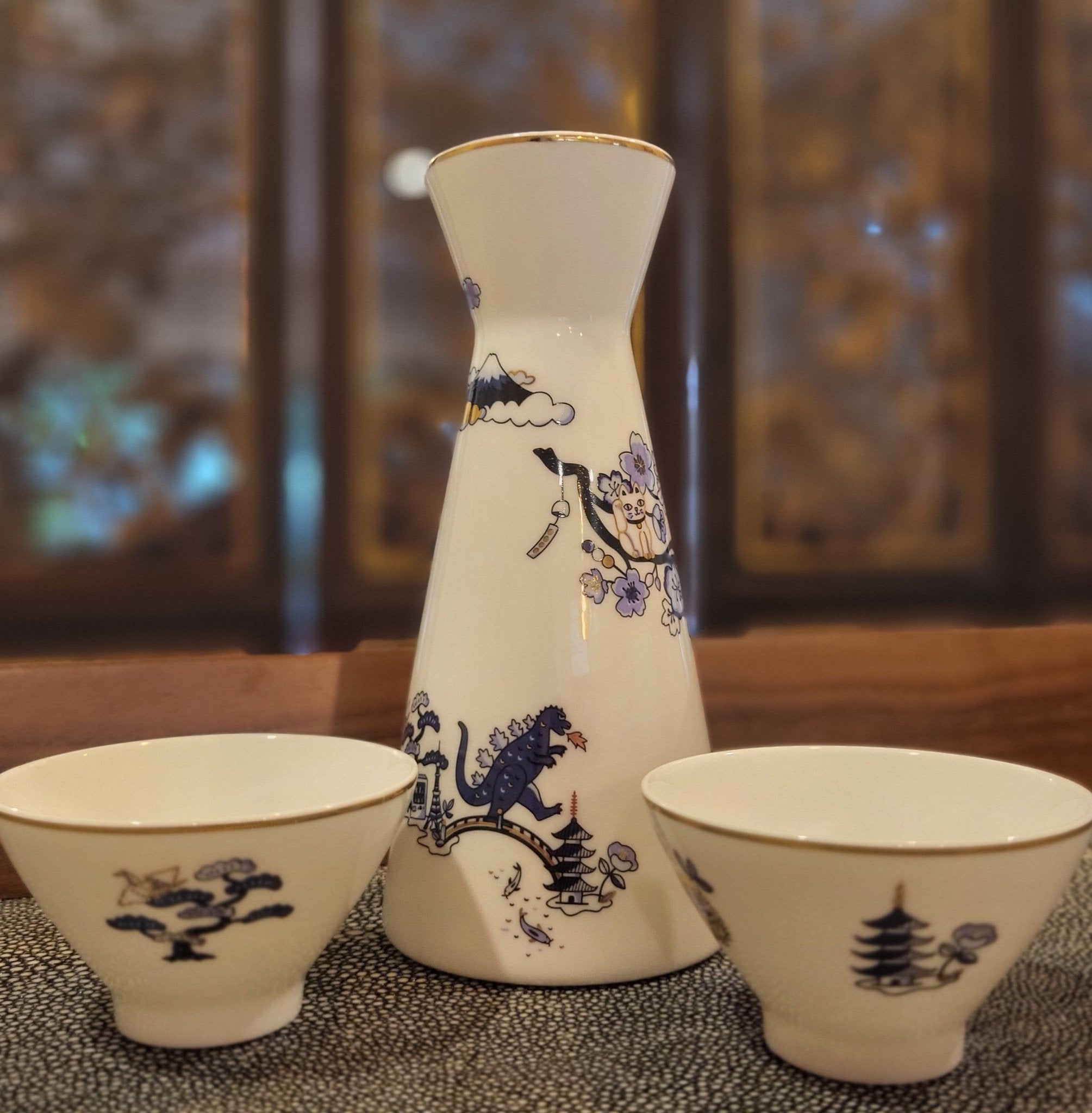 Fine bone china sake set with a Japanese toile design, one pourer and five cups in a gift box