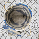 Blue seagrass laundry basket with lid from Inside Living, woven natural-fibre storage hamper for the home, alternate view