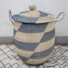 Blue seagrass laundry basket with lid from Inside Living, woven natural-fibre storage hamper for the home, side view
