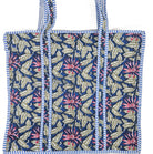 Tote bag with blue and white striped border and navy and pink floral pattern  