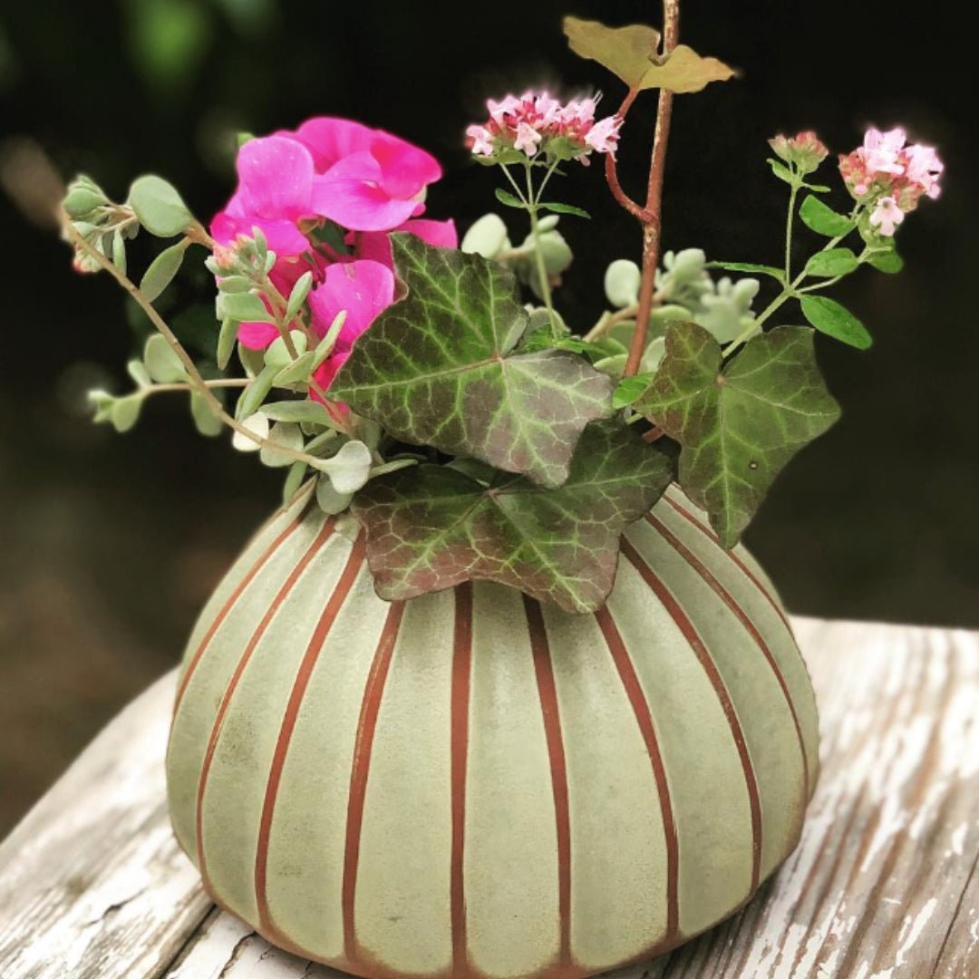 Sthal Salon round vase in avocado, ribbed high-fired terracotta, 16 cm diameter and 11 cm high, styled in a room setting