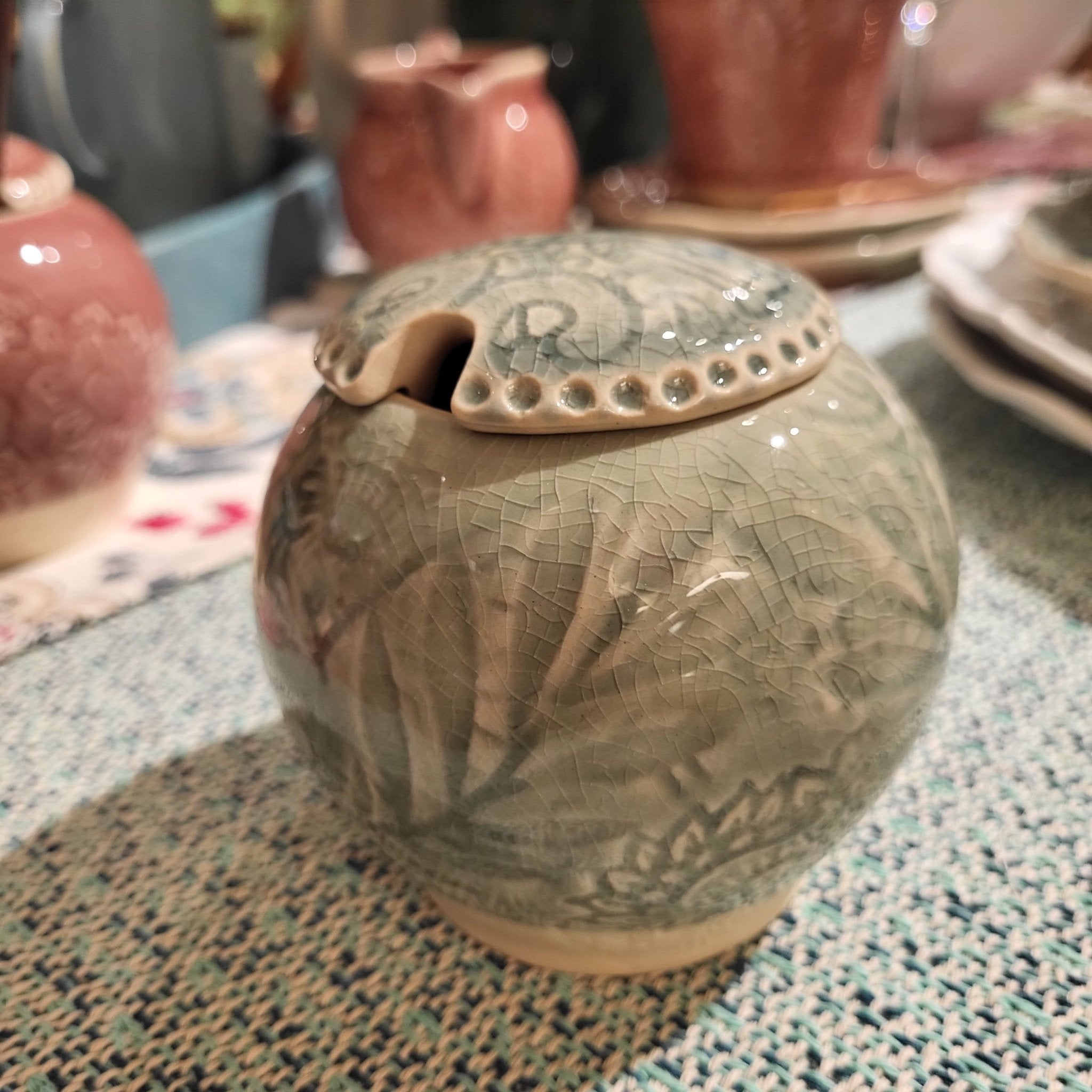 Ceramic Sugar Bowl close-up, plates from Inside Living Singapore.