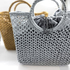 Summer basket from Inside Living, woven natural-fibre basket for storage, shopping or home display, angled view