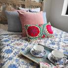 Suzani Linen Cushion Fergana, part of the Chair & Sofa Cushions collection at Inside Living Singapore, detail of the design.