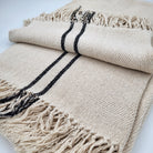 Handwoven 100% silk throw in cream with black stripe and fringed edge, 130 x 200 cm