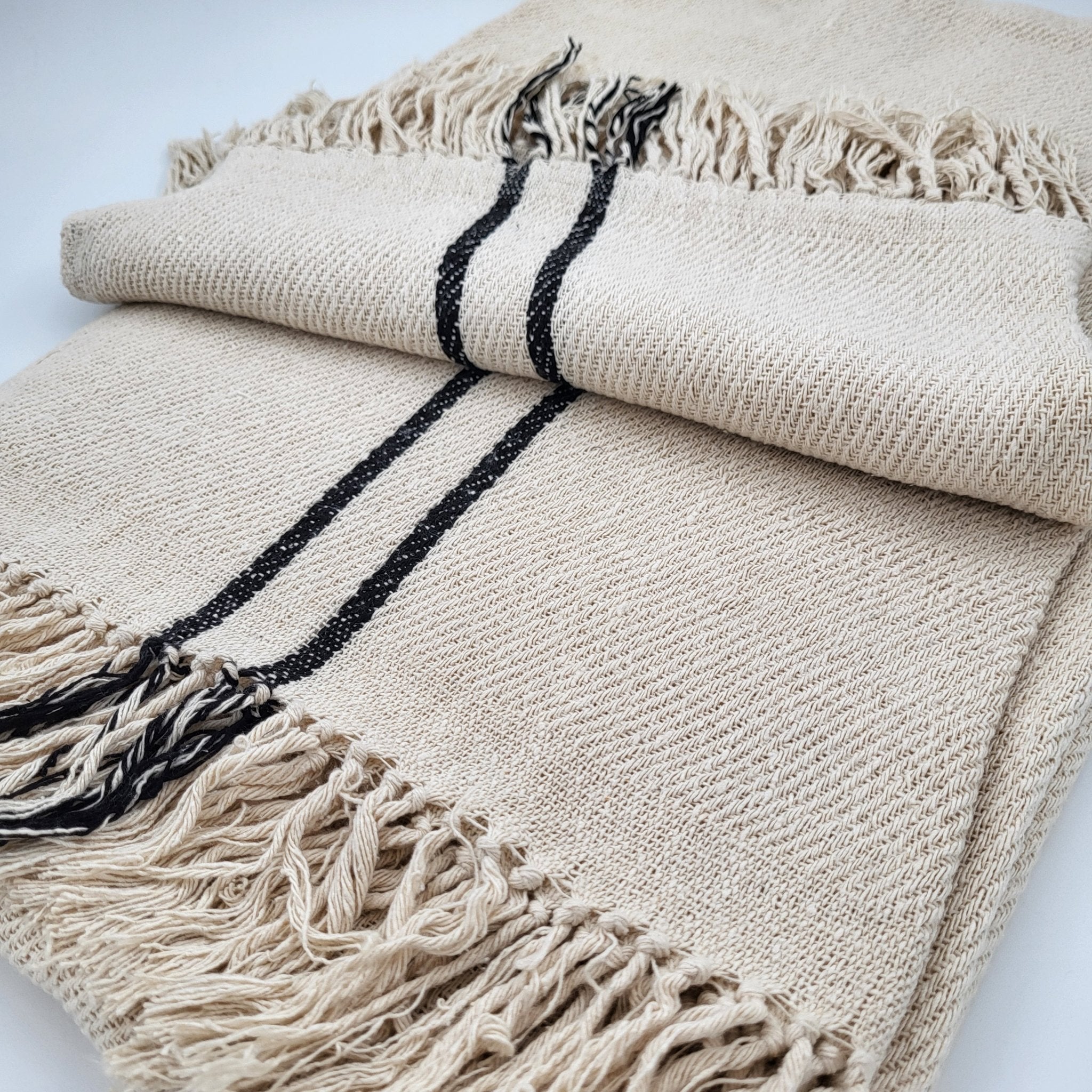 Handwoven 100% silk throw in cream with black stripe and fringed edge, 130 x 200 cm