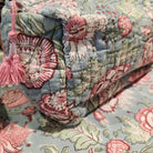 Block print cotton wash bag in hibiscus design, handmade toiletry and travel pouch for bathroom essentials, close-up view