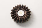 Tea light holder cast from a sandbox seed pod in resin, bronze finish, 12 x 12 cm for table or kitchen