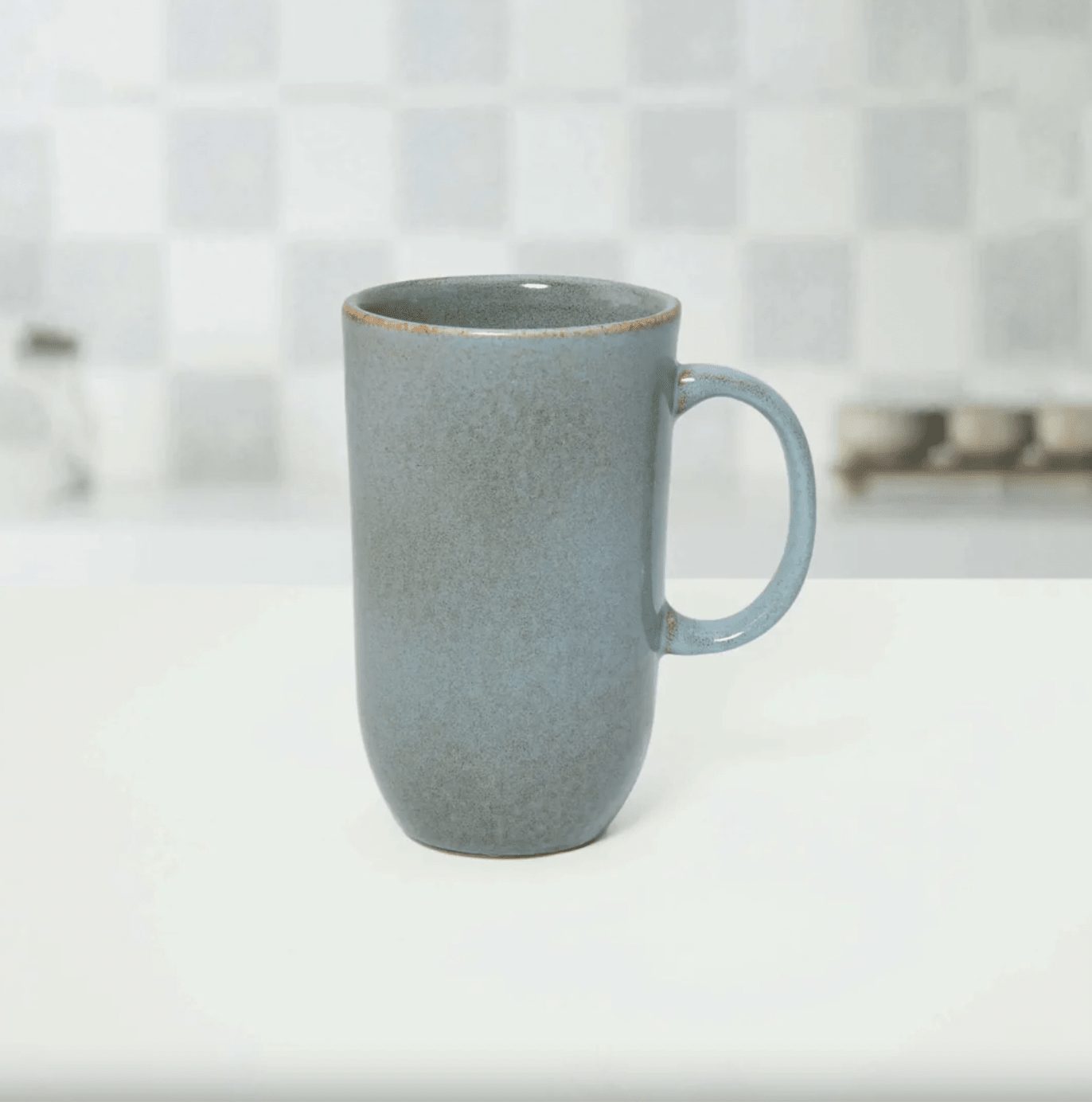 Tall rustic ceramic mug in aqua, 13 cm high and 400 ml, handmade so each piece is naturally unique