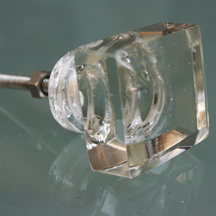 Set of two large square faceted glass door knobs, blending traditional and contemporary design