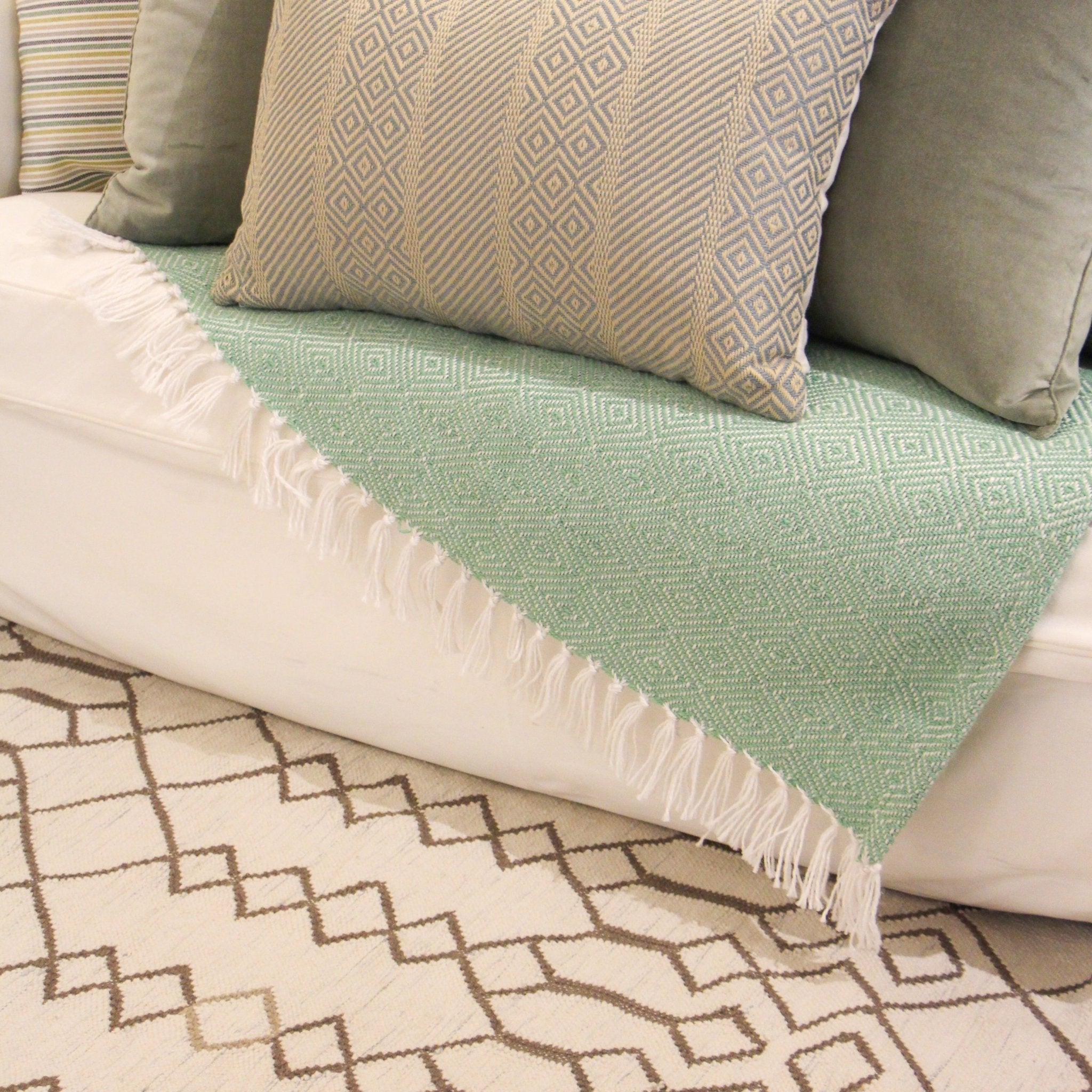 Duck egg Minerva cushion styled, soft blue patterned furnishing for a living room sofa, chair or bed.