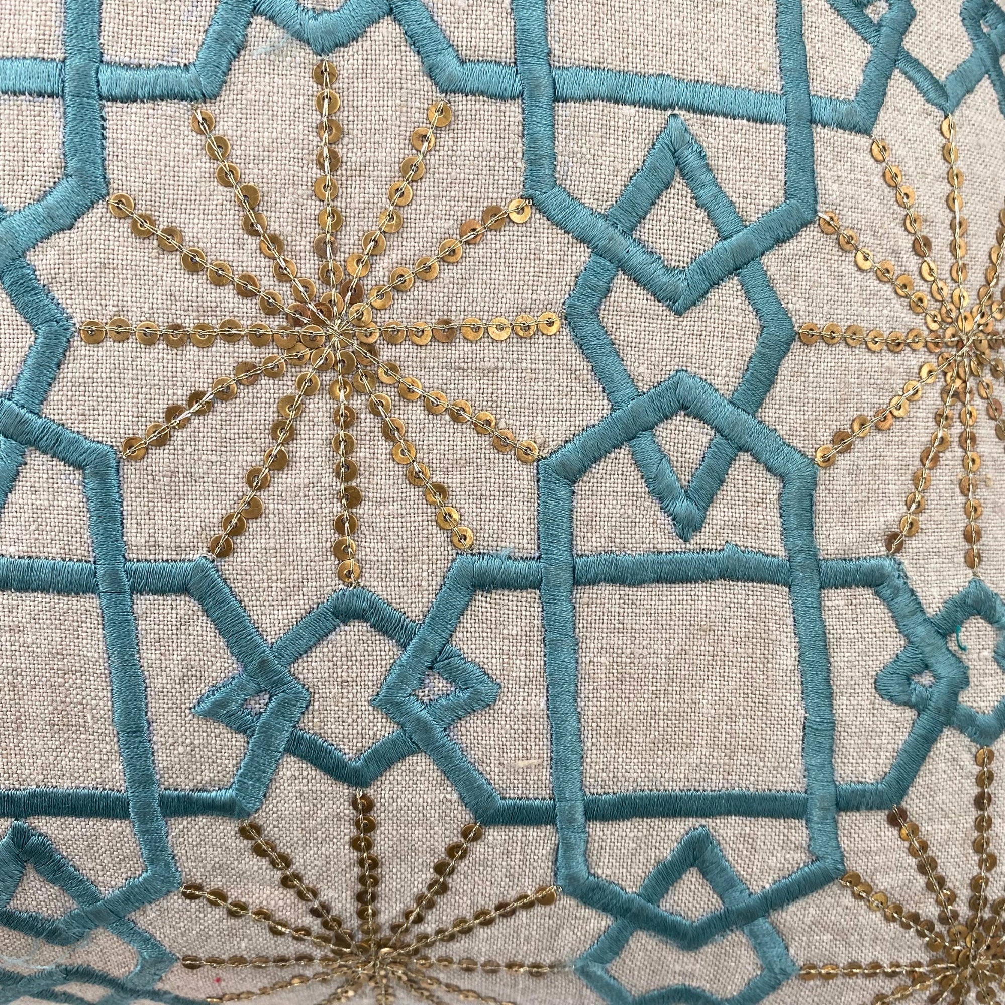 Suzani linen cushion in teal, hand-embroidered silk with metallic stars on natural linen, 45 x 45 cm
