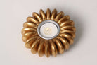 Tea light holder cast from a sandbox seed pod in resin, gold finish, 12 x 12 cm for table or kitchen